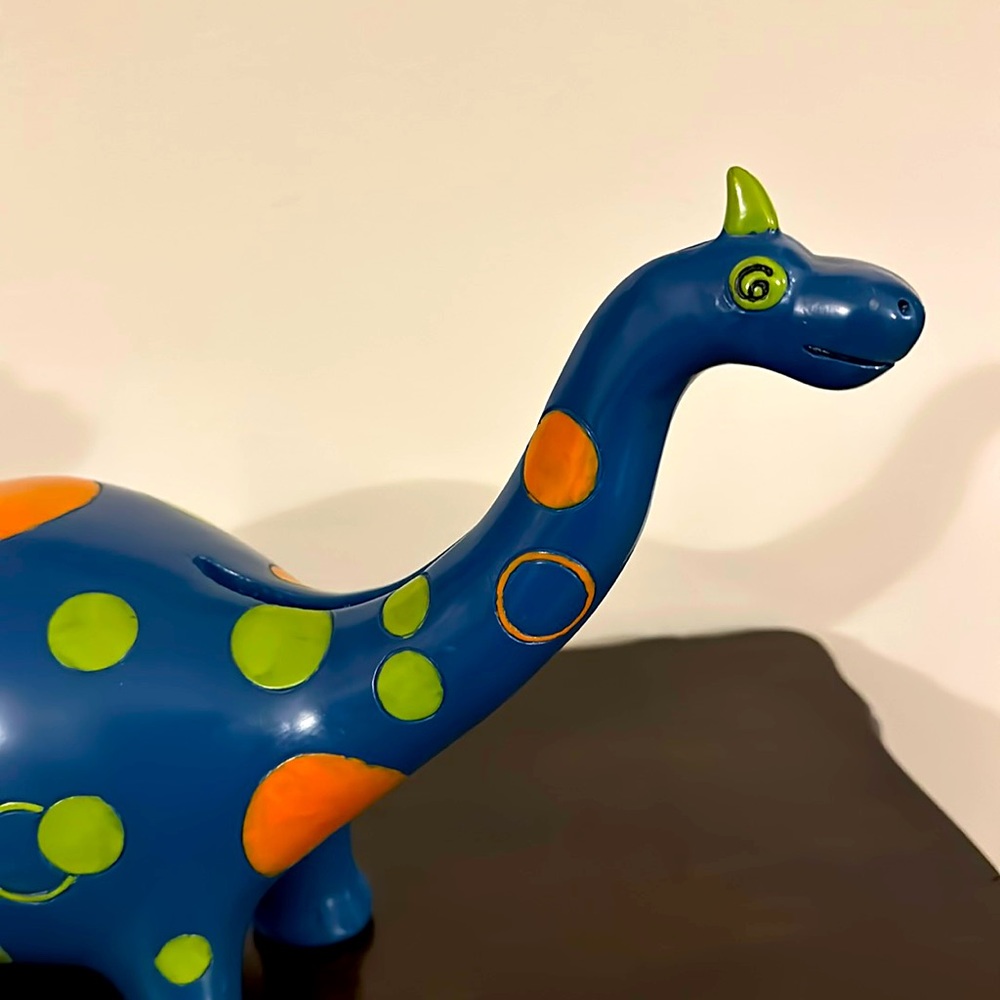 Gorgeous dinosaur “piggy bank” vintage.